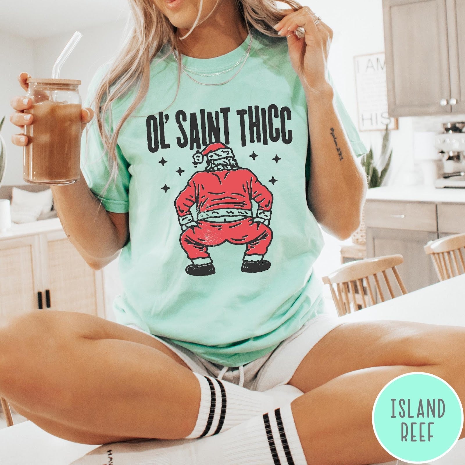 Comfort Colors tee in Island Reef featuring festive graphic style Santa Claus doing a dance move with stars