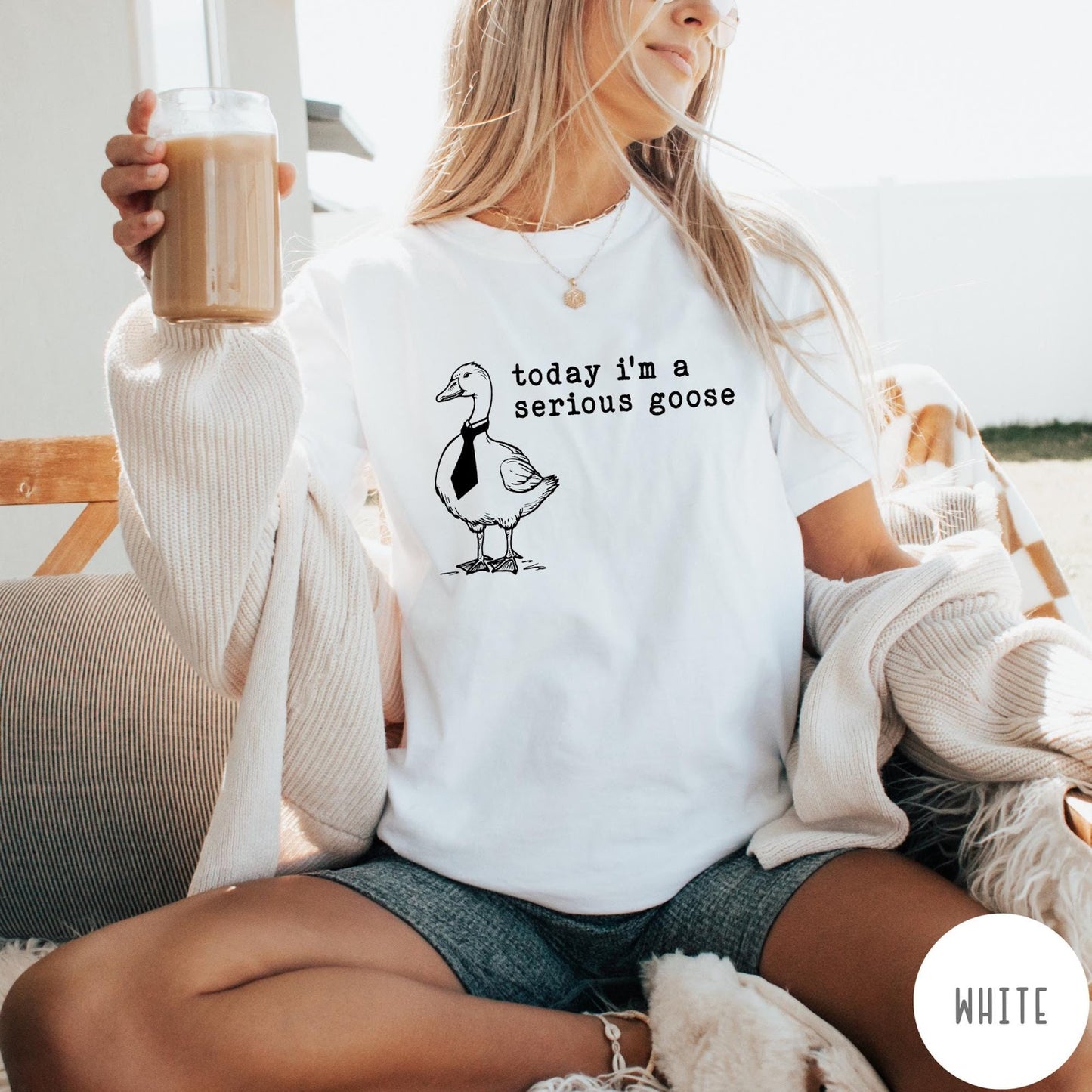 Comfort Colors tee in White featuring minimalist graphic design of a goose wearing a necktie and text