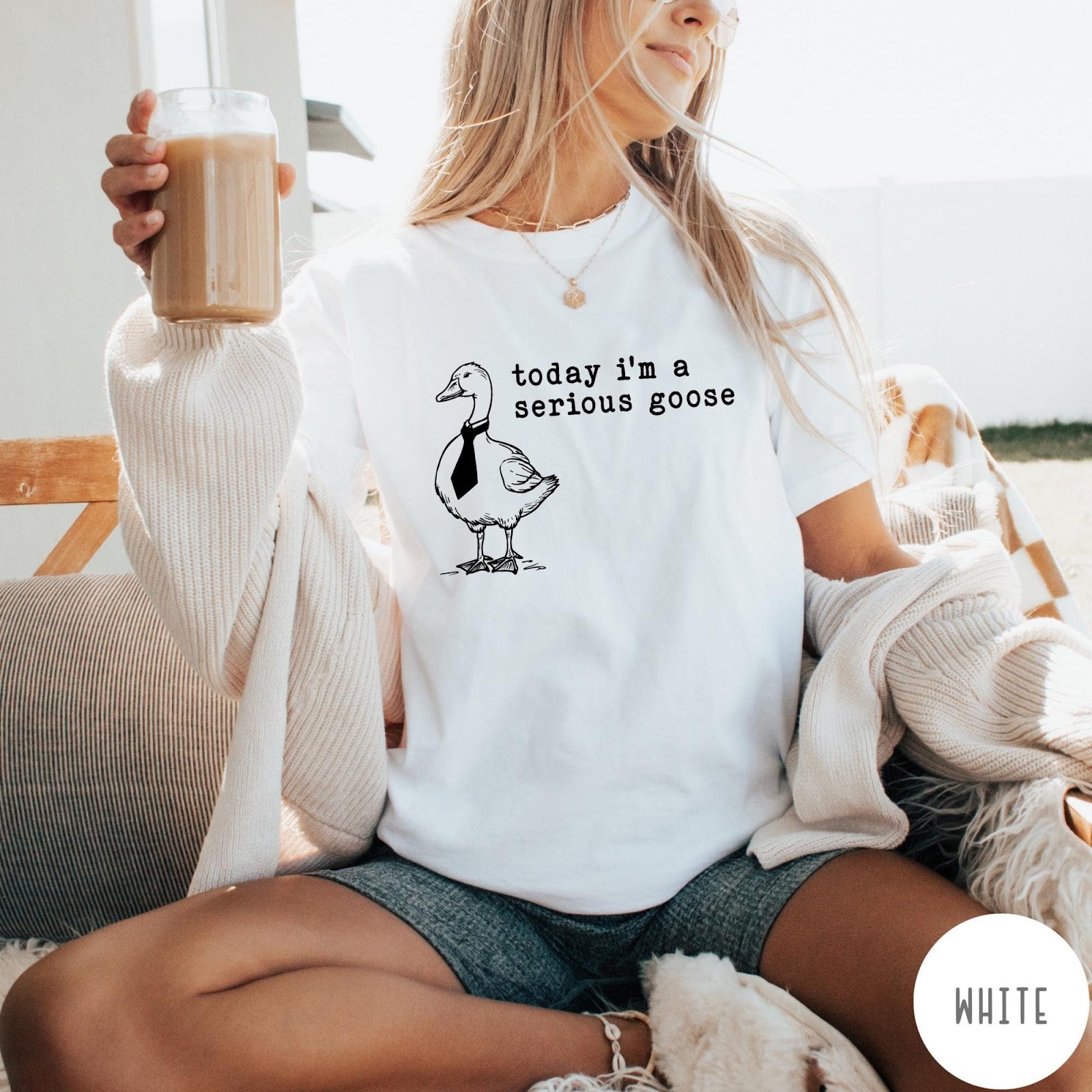 Comfort Colors tee in White featuring minimalist graphic design of a goose wearing a necktie and text