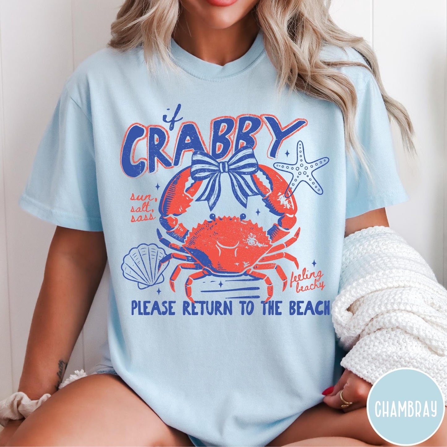 Comfort Colors tee in Chambray featuring beachy crab graphic with bow, starfish, seashell, and coastal text