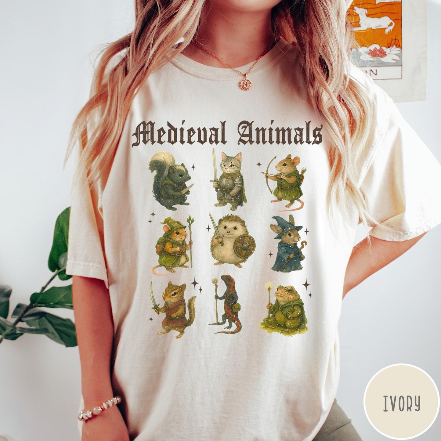 Comfort Colors tee in Ivory featuring medieval fantasy style graphic of nine various animals in knightly attire