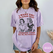 Comfort Colors tee in Orchid featuring vintage style graphic of two women comforting each other with text