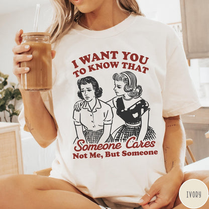 Comfort Colors tee in Ivory featuring vintage style graphic of two women comforting each other with text