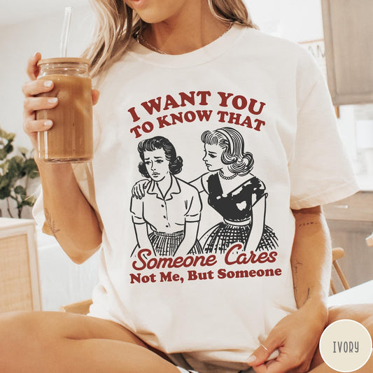 Comfort Colors tee in Ivory featuring vintage style graphic of two women comforting each other with text