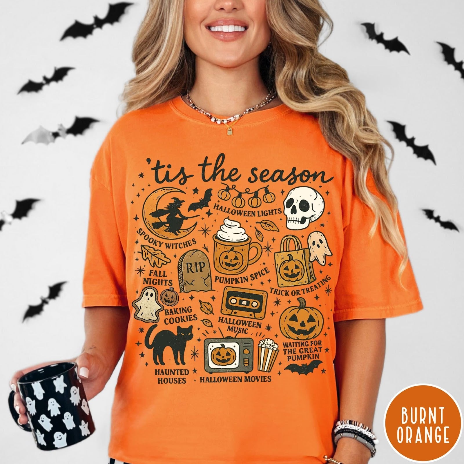 Comfort Colors tee in Burnt Orange featuring Halloween icons collage with witch, skull, pumpkin, and spooky fall graphics