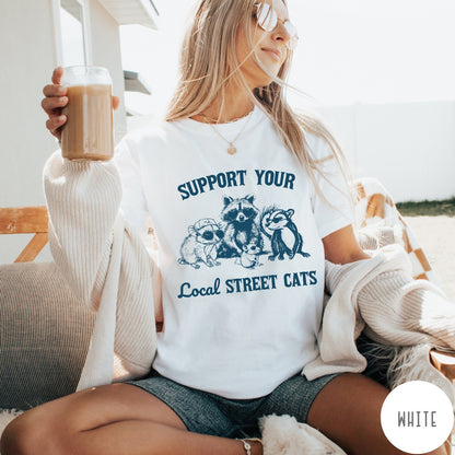 Comfort Colors tee in White featuring illustration style graphic of a raccoon, opossum, and skunk wearing sunglasses