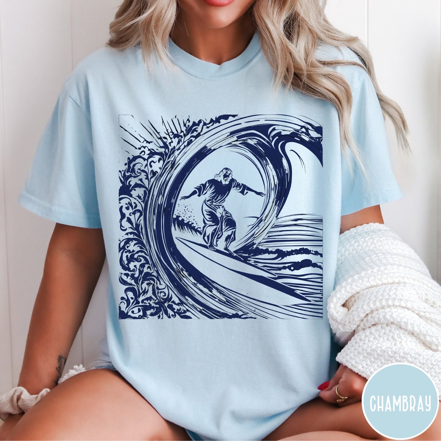 Comfort Colors tee in Chambray featuring graphic style Jesus surfing on a large ocean wave