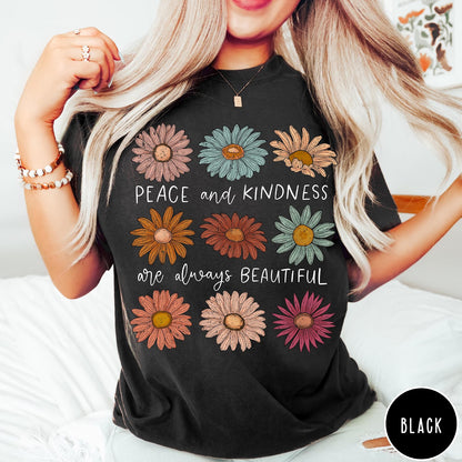 Comfort Colors tee in Black featuring floral style graphic with daisies and text Peace and Kindness are always beautiful