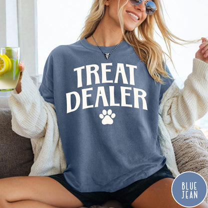 Comfort Colors tee in Blue Jean featuring dog owner design with Treat Dealer text and a paw print