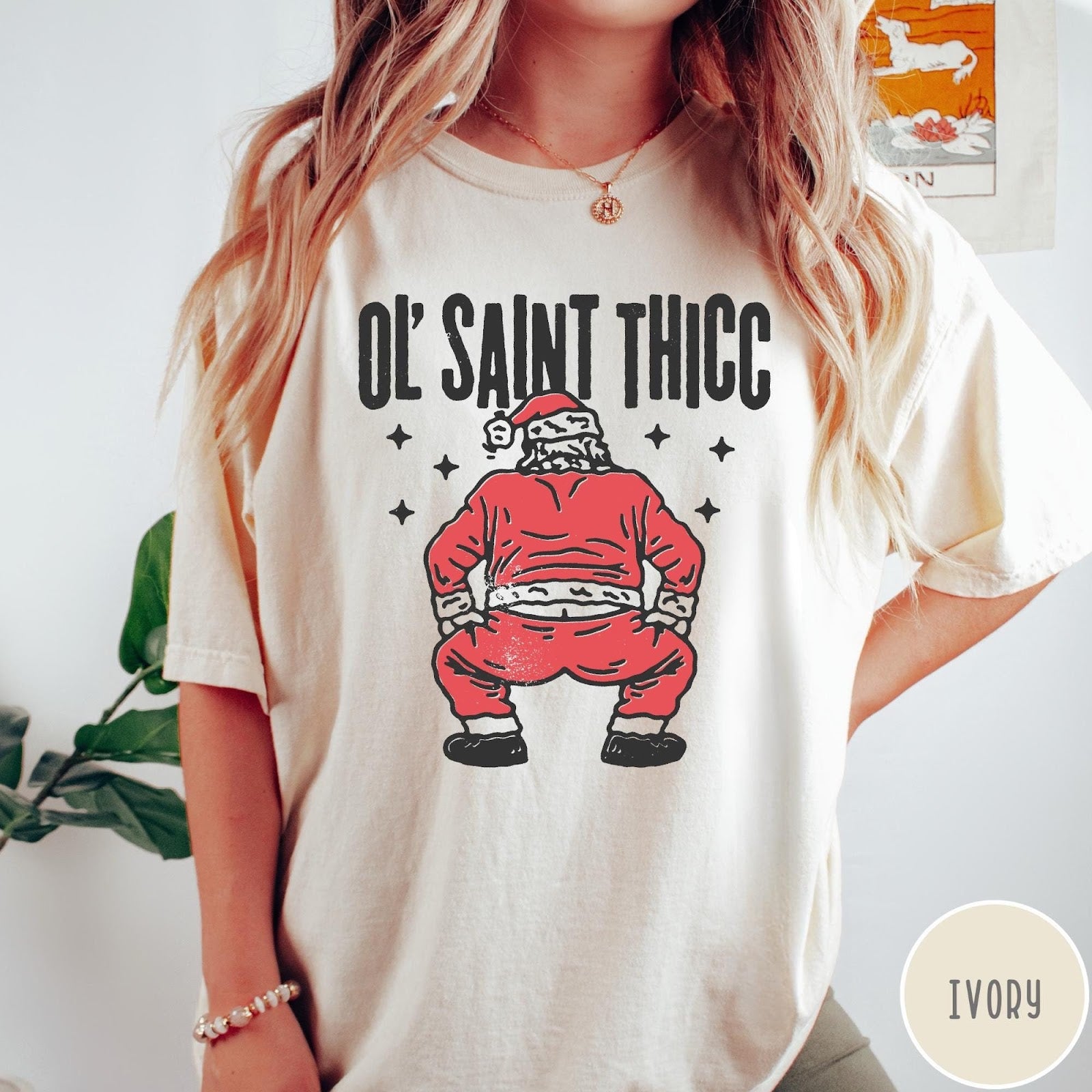 Comfort Colors tee in Ivory featuring festive graphic style Santa Claus doing a dance move with stars