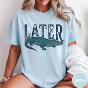 Comfort Colors tee in Chambray featuring casual style with a graphic of a green alligator and text