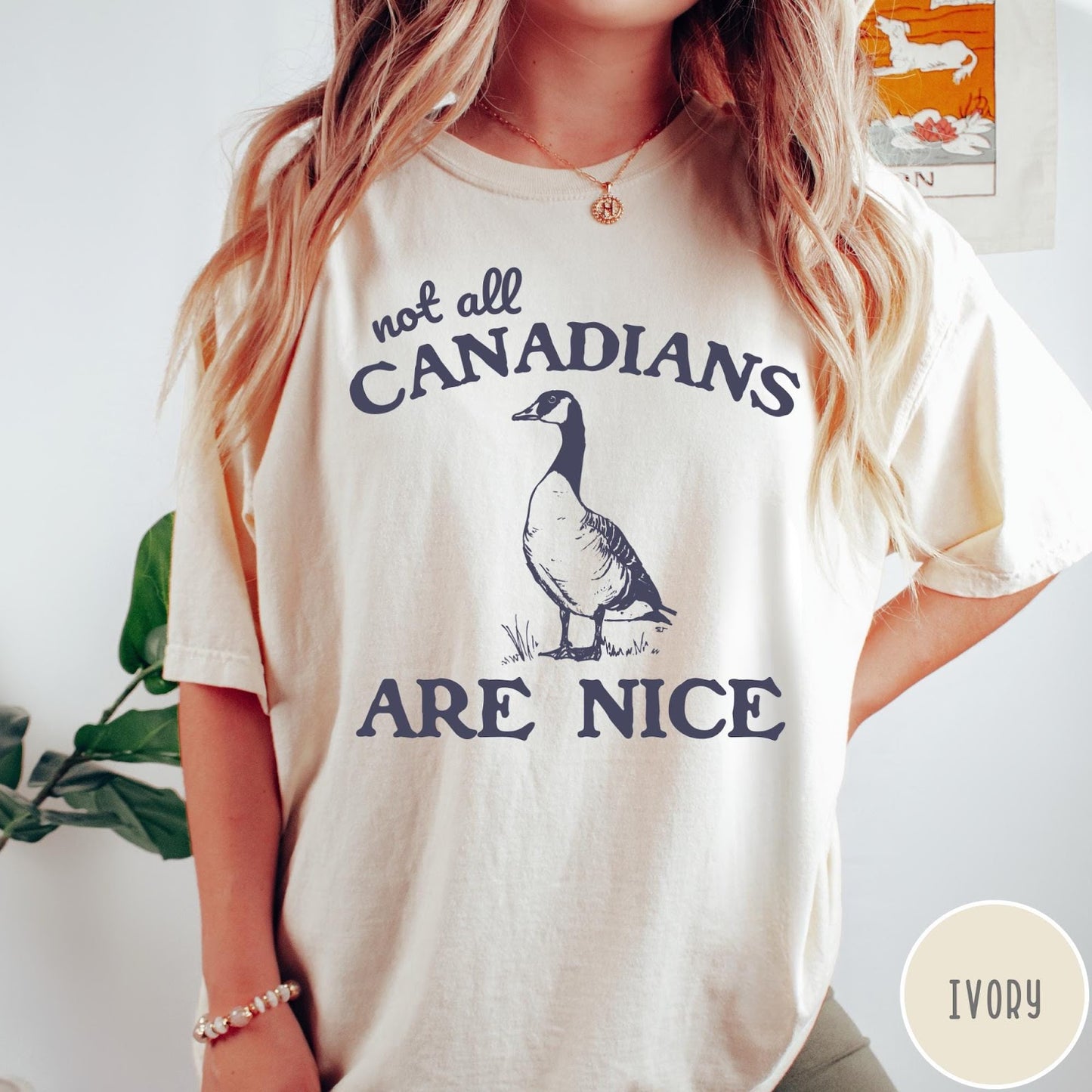 Comfort Colors tee in Ivory featuring casual graphic design of a Canada goose and humorous text