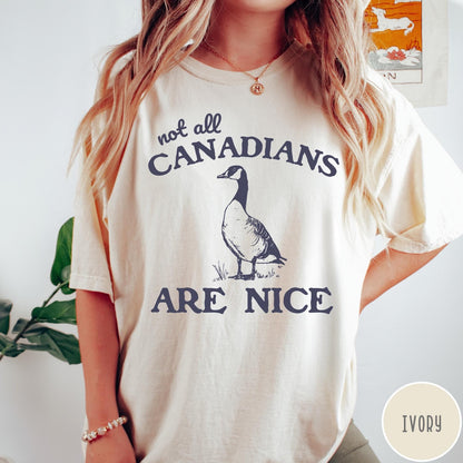 Comfort Colors tee in Ivory featuring casual graphic design of a Canada goose and humorous text