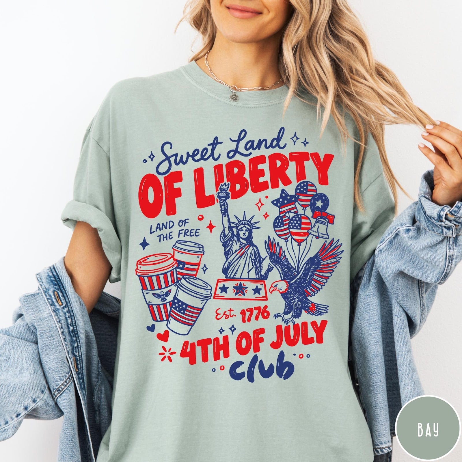 Comfort Colors tee in Bay featuring patriotic 4th of July graphic with Statue of Liberty and eagle