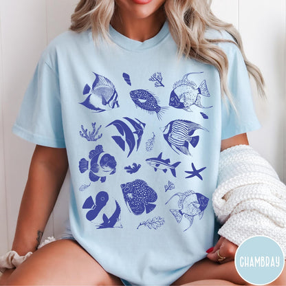 Comfort Colors tee in Chambray featuring coastal style graphic with various tropical fish and ocean life illustrations