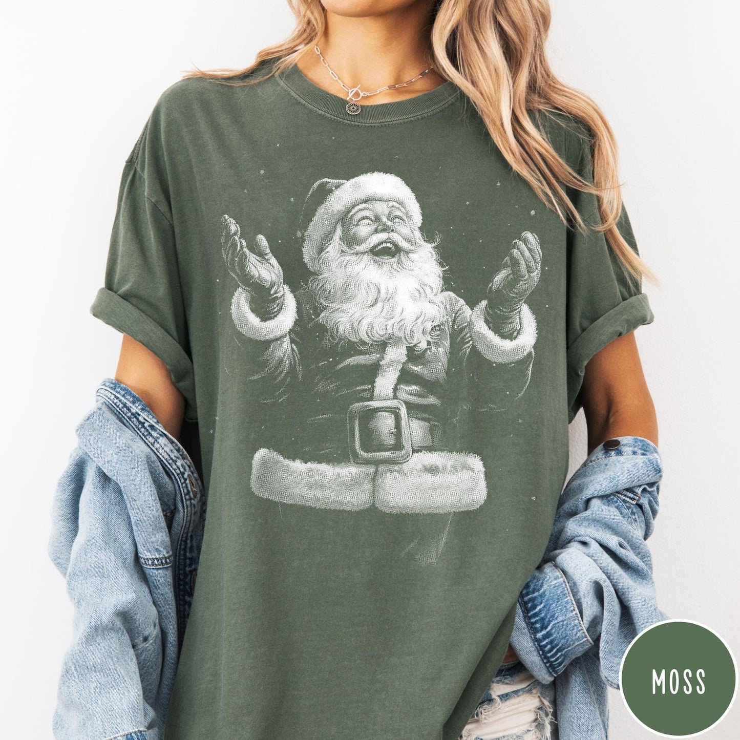 Comfort Colors tee in Moss featuring vintage style graphic of a laughing Santa Claus with open arms