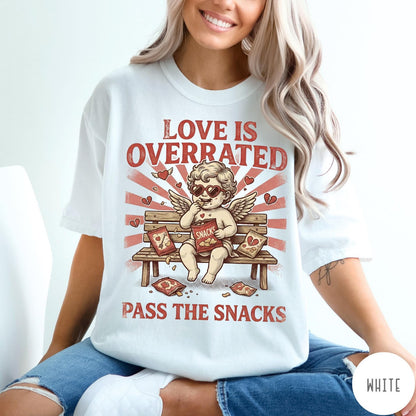 Comfort Colors tee in White featuring vintage style graphic of a cherub eating snacks on a bench