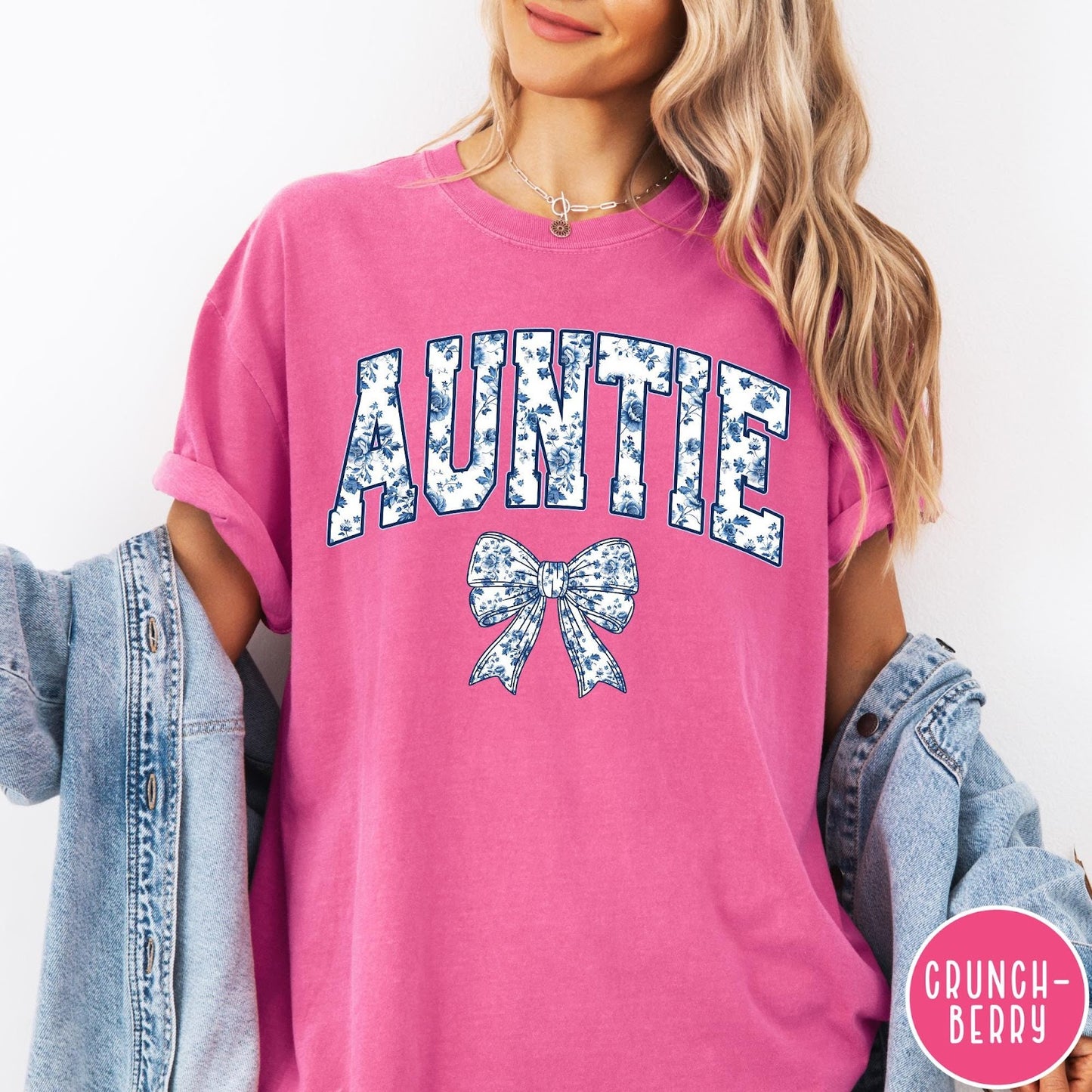 Comfort Colors tee in Crunchberry featuring floral bow graphic with the word Auntie in blue floral print