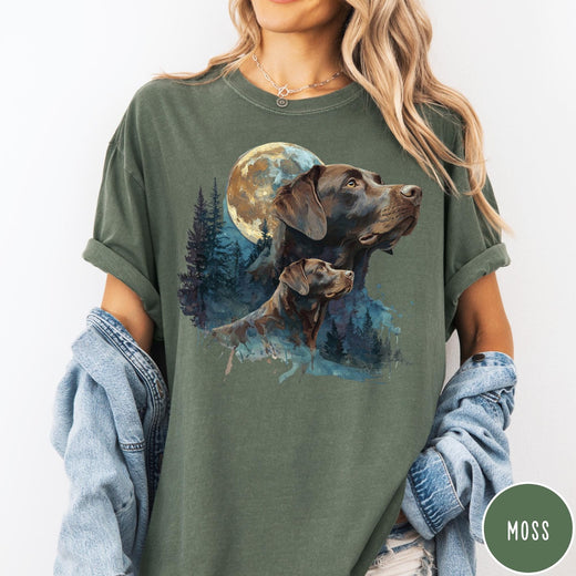 Comfort Colors tee in Moss featuring vintage style graphic of two Chocolate Labradors under a full moon