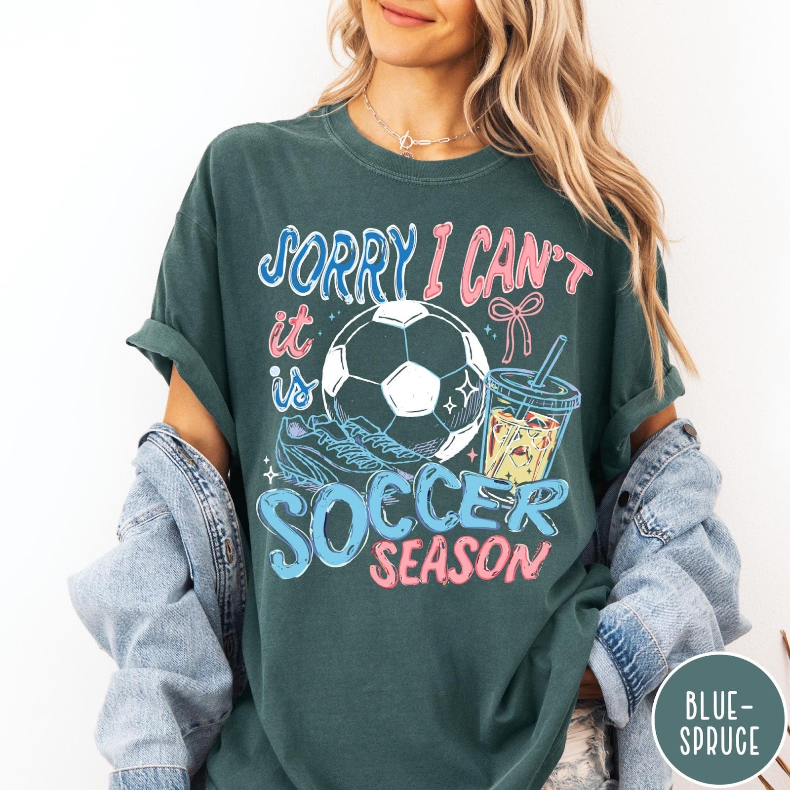 Comfort Colors tee in Blue Spruce featuring soccer season graphic with soccer ball, cleats, and iced coffee