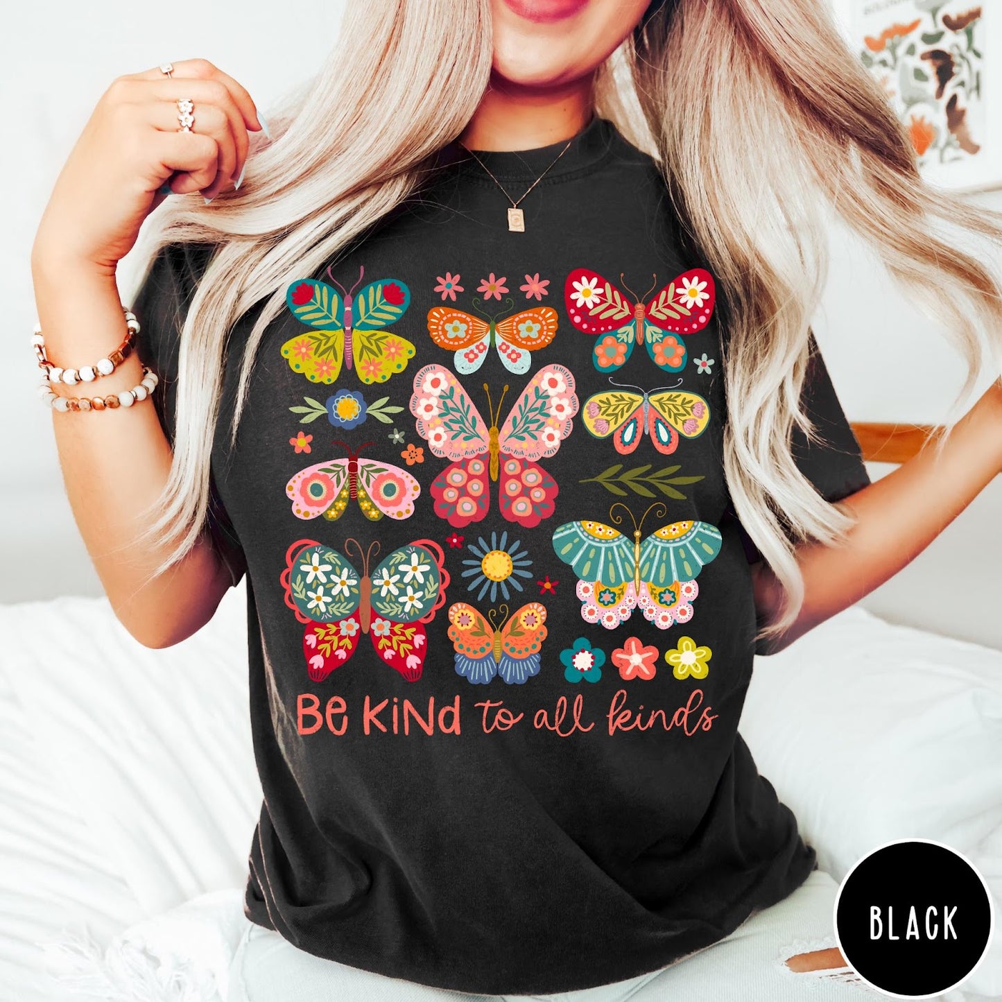 Comfort Colors tee in Black featuring colorful butterfly and floral graphic with Be Kind to all kinds text