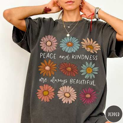 Comfort Colors tee in Pepper featuring floral design with Peace and Kindness are always beautiful text graphic