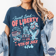 Comfort Colors tee in Midnight featuring 4th of July celebration graphic with Statue of Liberty and eagle