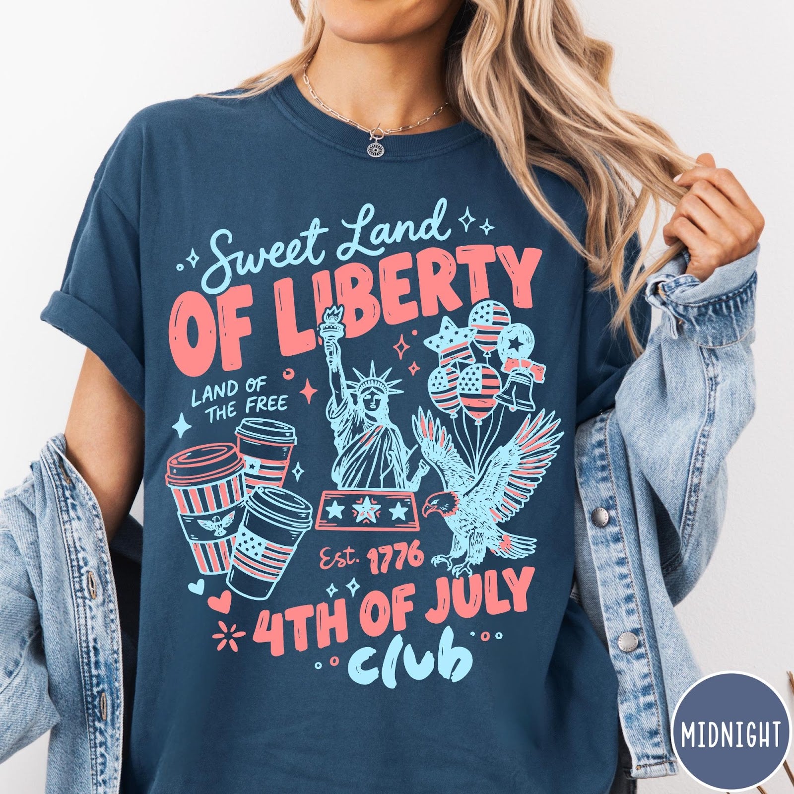 Comfort Colors tee in Midnight featuring 4th of July celebration graphic with Statue of Liberty and eagle