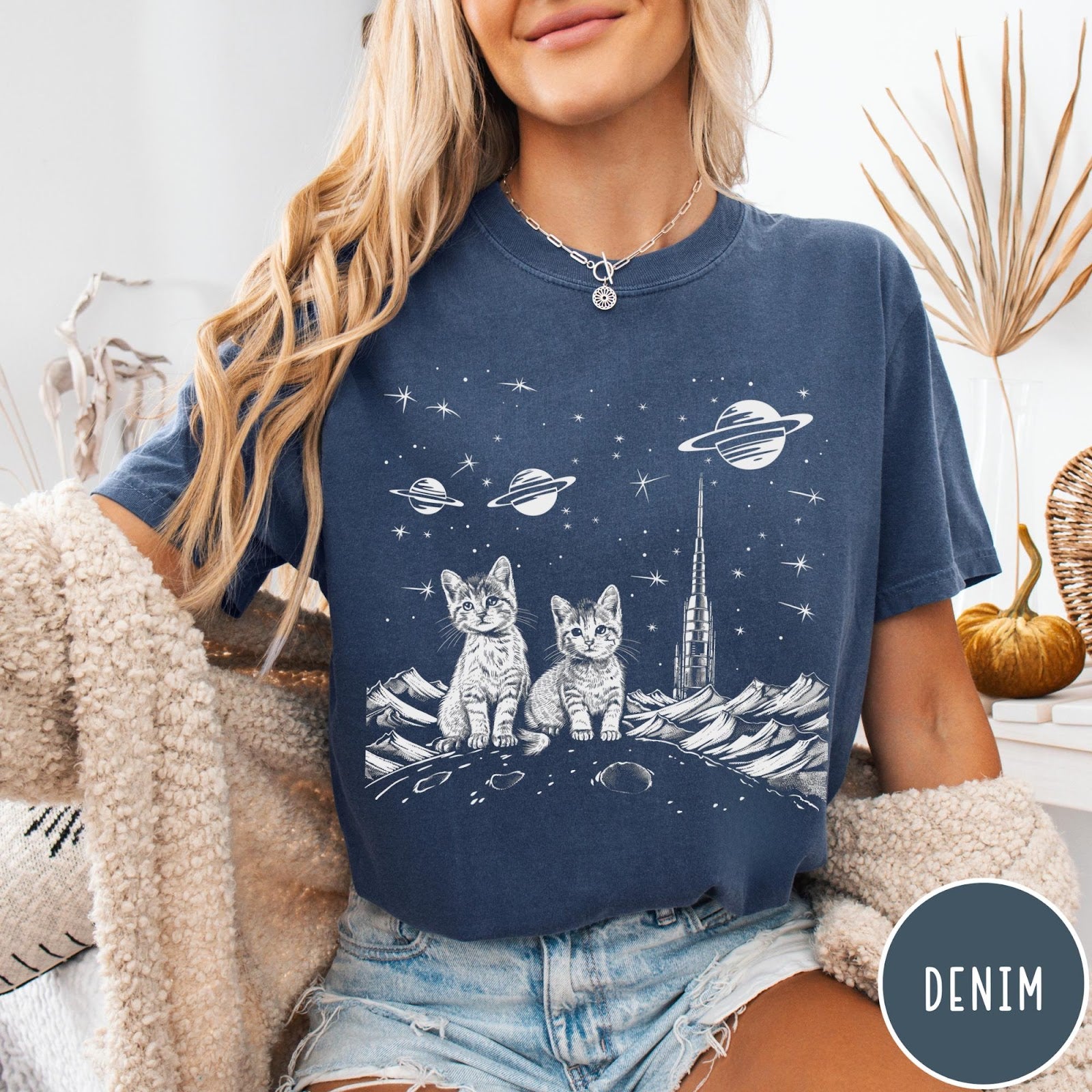 Comfort Colors tee in Denim featuring line art graphic of two kittens sitting on a planet with rocket