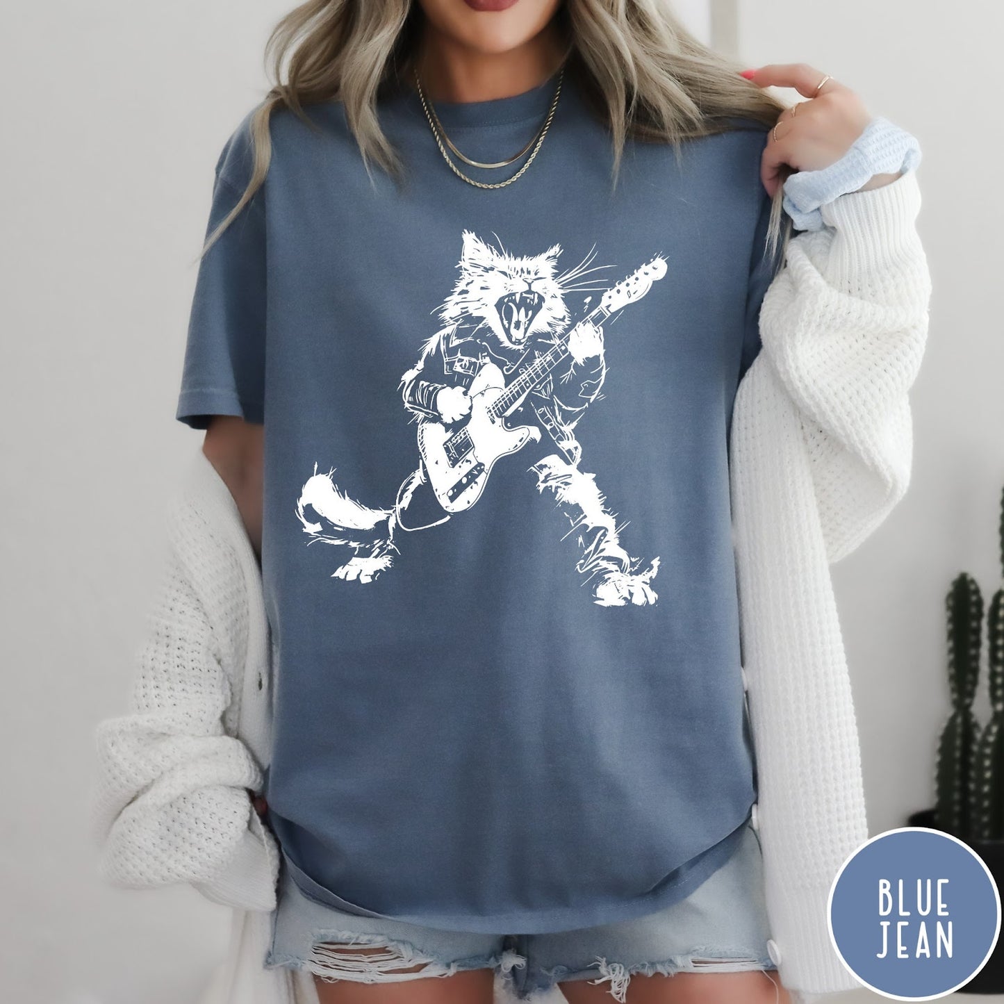 Comfort Colors tee in Blue Jean featuring rock music style graphic of a cat playing an electric guitar