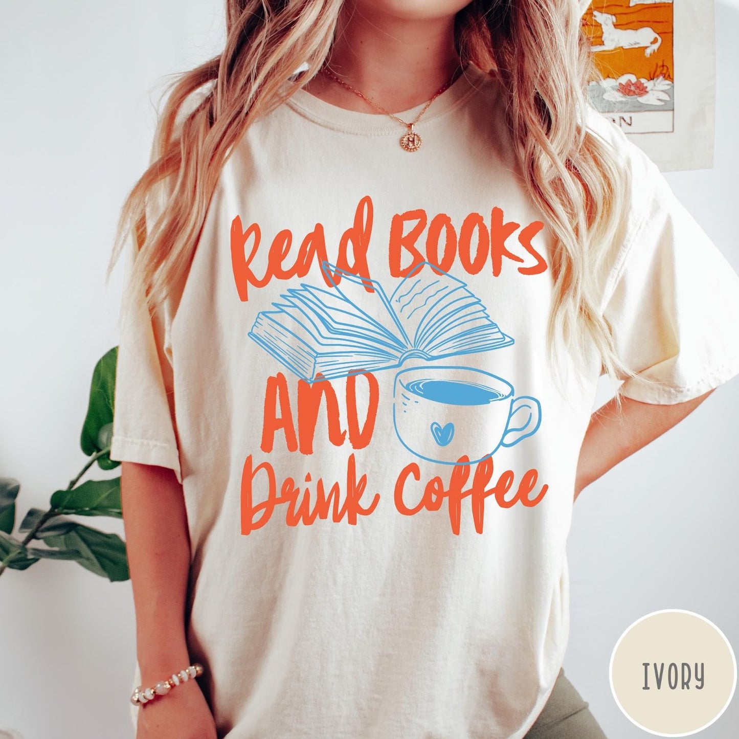 Comfort Colors tee in Ivory featuring books and coffee graphic design with open book and coffee cup