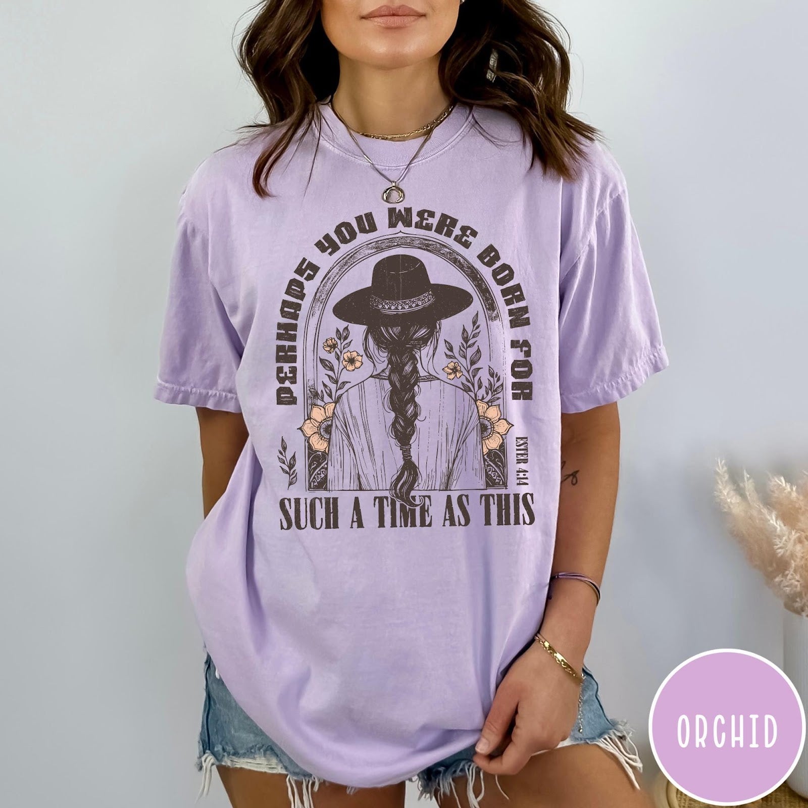 Comfort Colors tee in Orchid featuring boho style graphic of a woman in a hat with flowers