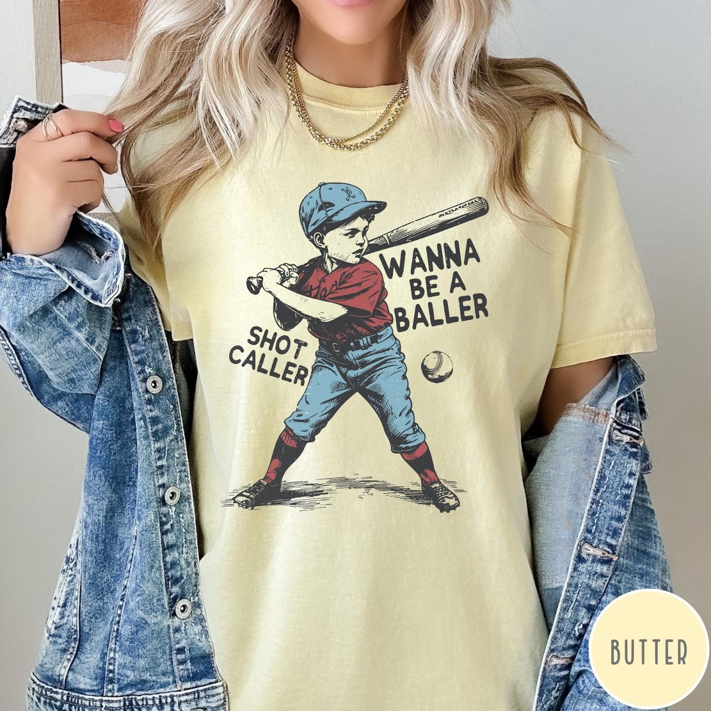 Comfort Colors tee in Butter featuring vintage style baseball player graphic with Wanna Be a Baller text