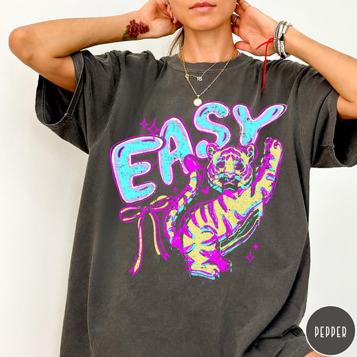 Comfort Colors tee in Pepper featuring retro style graphic of a tiger with blue and orange colors
