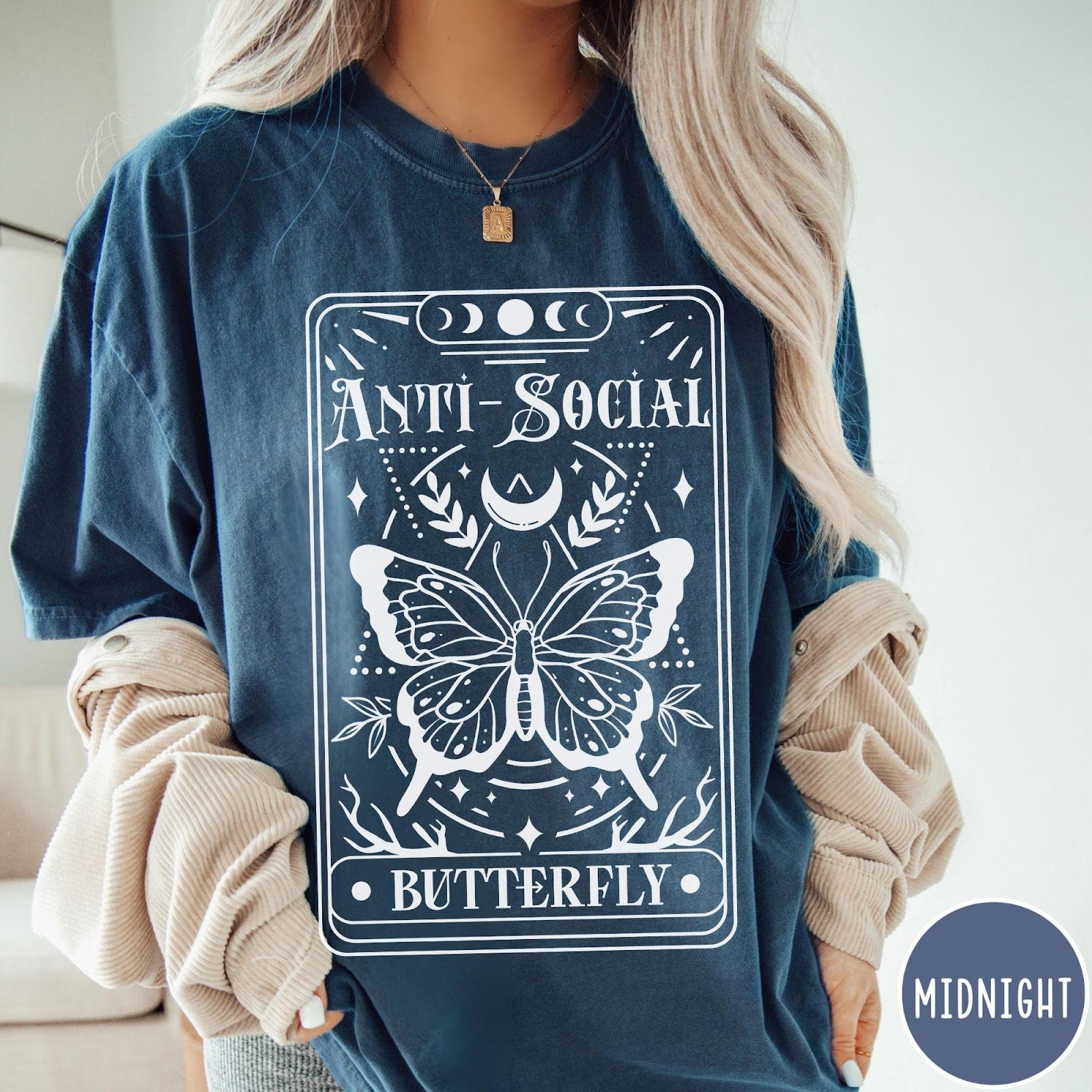 Comfort Colors tee in Midnight featuring tarot card style graphic with butterfly and celestial moon phase design