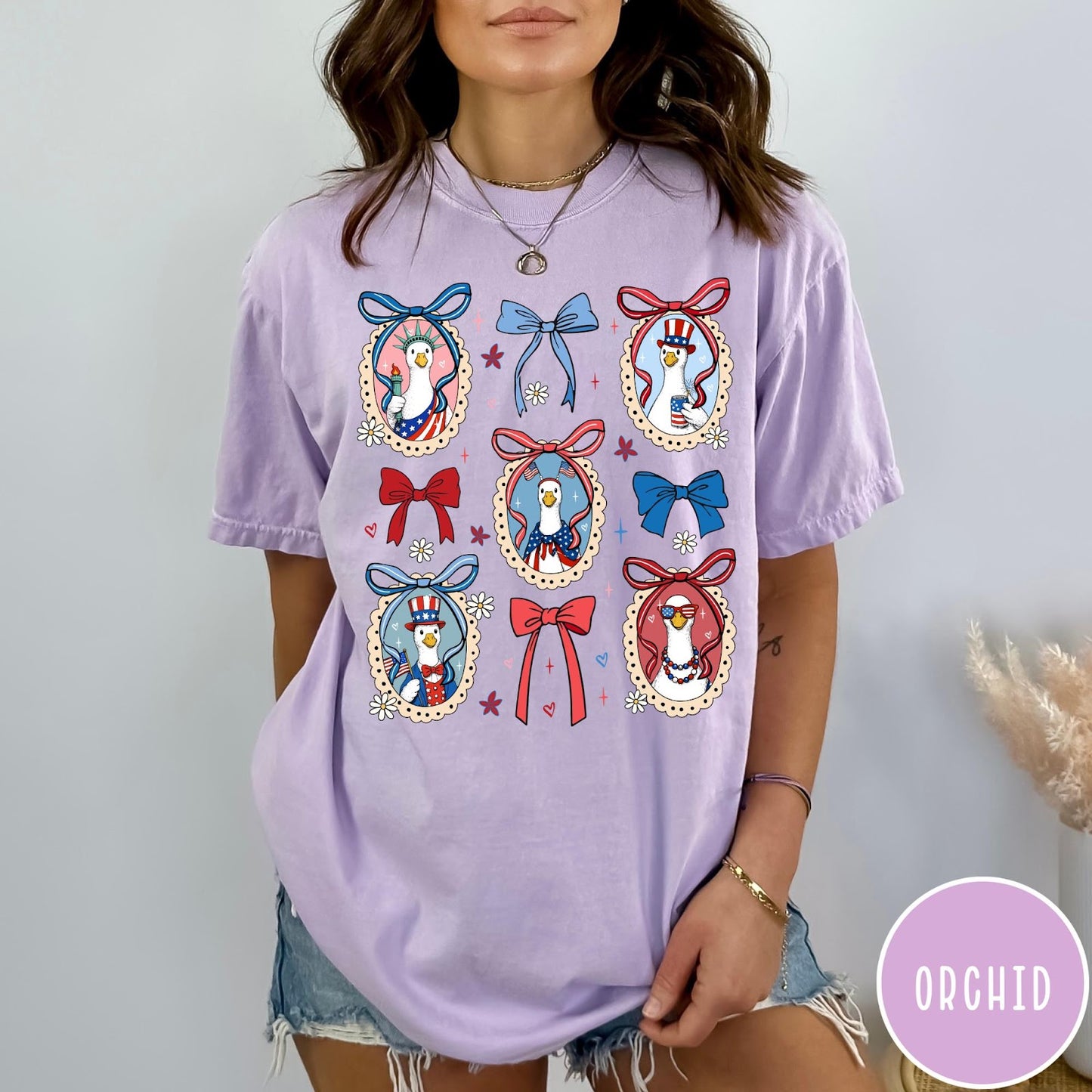 Comfort Colors tee in Orchid featuring coquette design with patriotic geese in frames and bows
