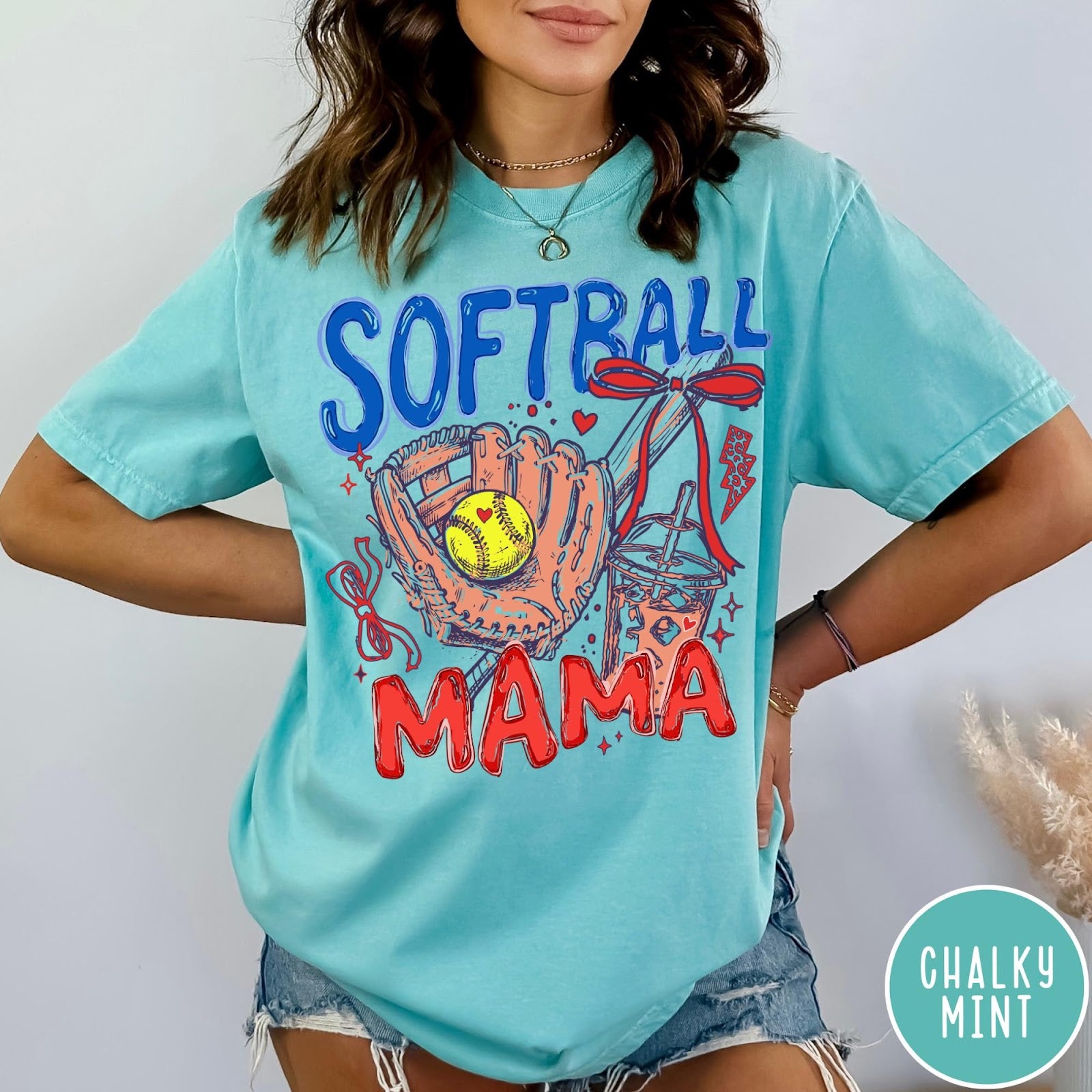Comfort Colors tee in Chalky Mint featuring softball mom graphic with glove, ball, and iced coffee design