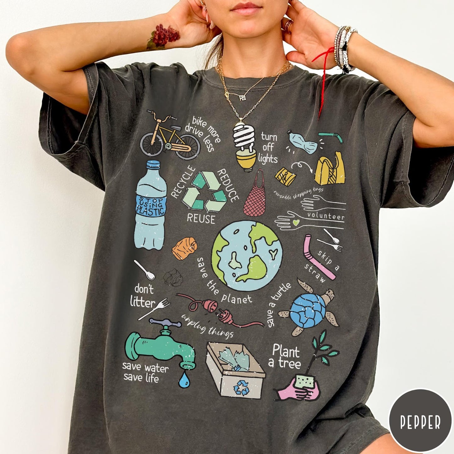 Comfort Colors tee in Pepper featuring environmental awareness graphic with icons for recycling, saving water, and nature.