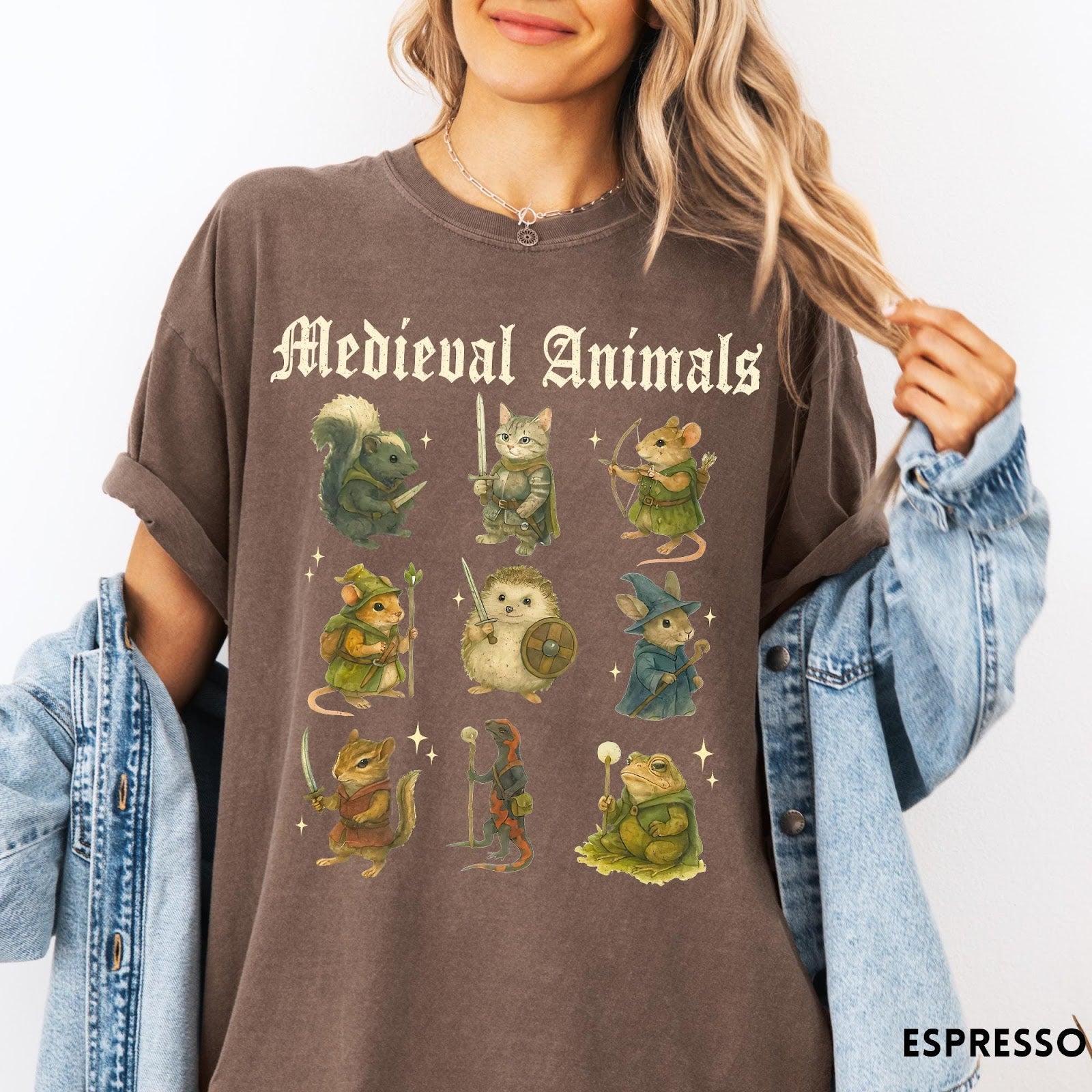 Comfort Colors tee in Espresso featuring medieval animals graphic with fantasy characters including a cat, hedgehog, and frog