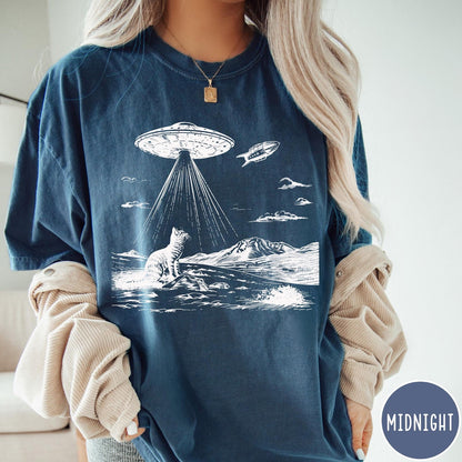 Comfort Colors tee in Midnight featuring retro graphic style cat and UFO abduction scene in white ink