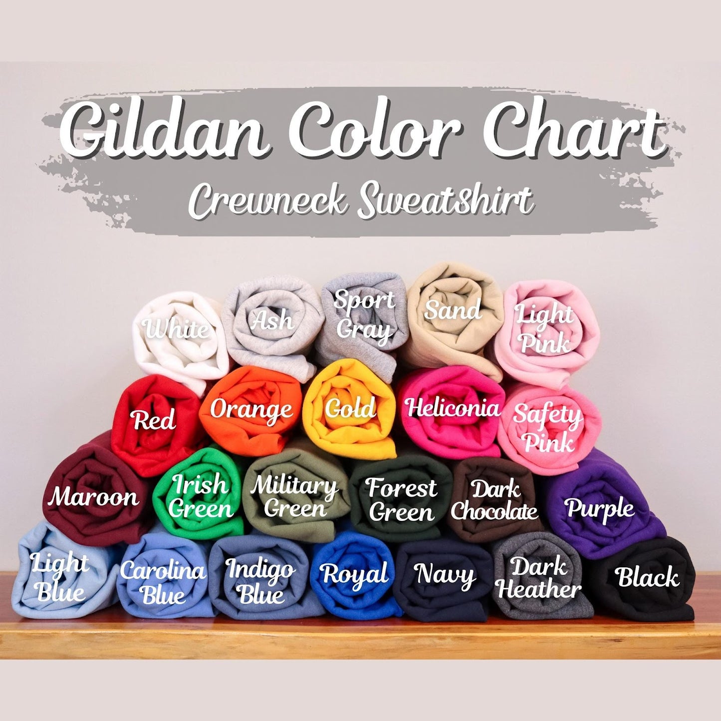 Gildan crewneck sweatshirt color chart showing available garment colors in a stacked roll display