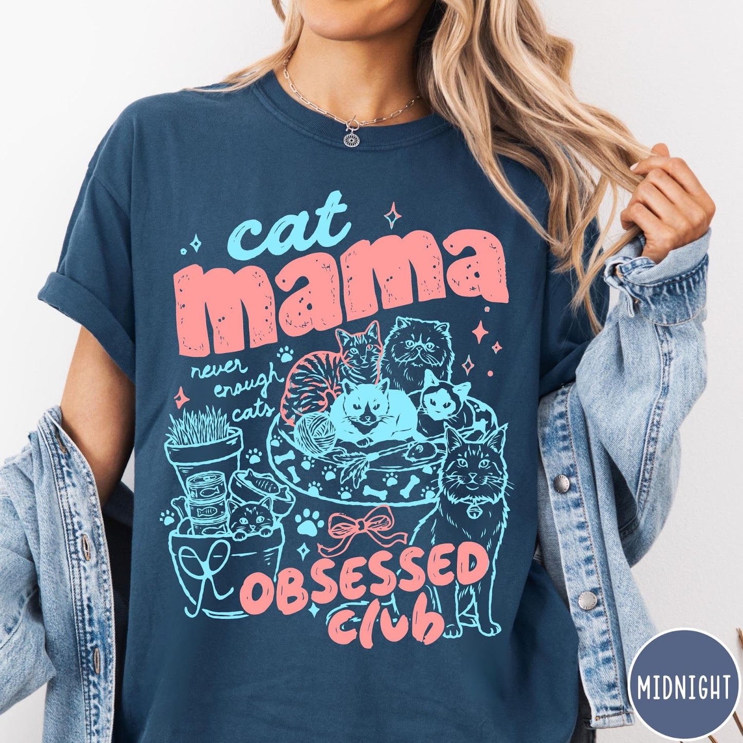 Comfort Colors tee in Midnight featuring cat mama club graphic with multiple cats and pink blue ink
