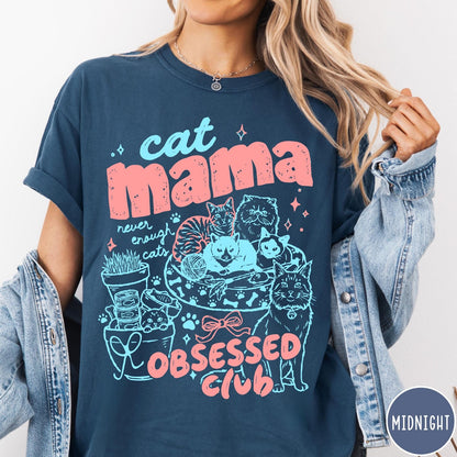 Comfort Colors tee in Midnight featuring cat mama club graphic with multiple cats and pink blue ink
