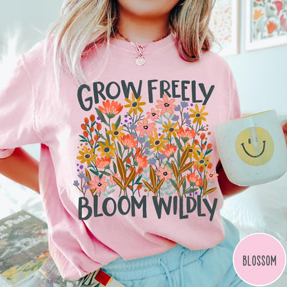 Comfort Colors tee in Blossom featuring wildflower design with colorful flowers and Grow Freely Bloom Wildly text