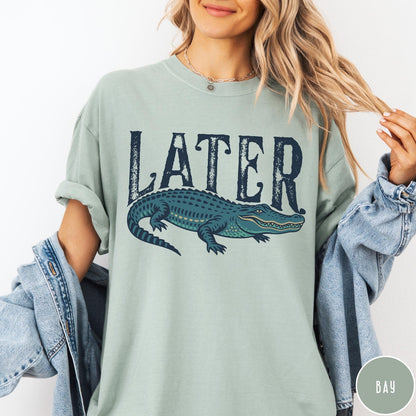 Comfort Colors tee in Bay featuring casual style with a graphic of a green alligator and text