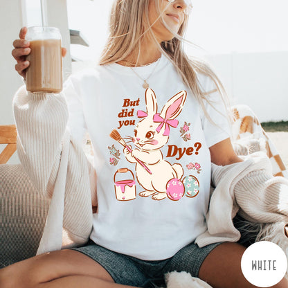 Comfort Colors tee in White featuring cute Easter bunny graphic with paintbrush and painted Easter eggs.