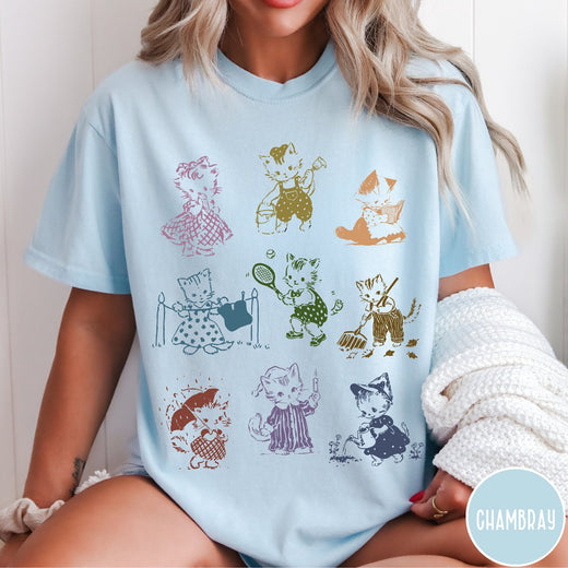 Comfort Colors tee in Chambray featuring vintage retro style graphic of nine kittens doing various daily activities