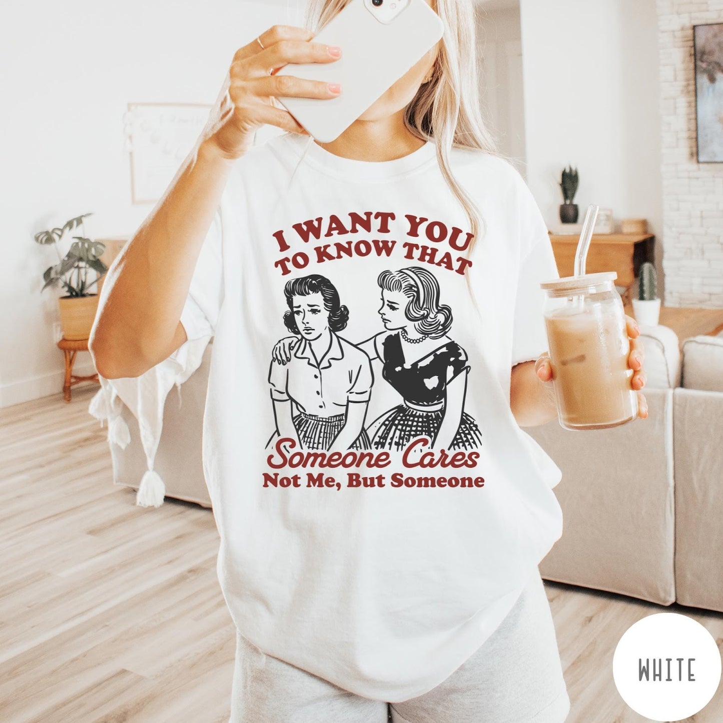 Comfort Colors tee in White featuring vintage style graphic of two women comforting each other with text