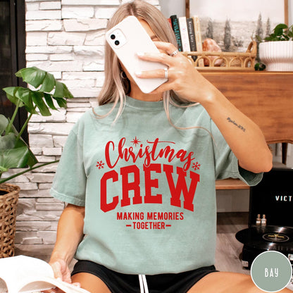 Comfort Colors tee in Bay featuring Christmas family gathering graphic with text Christmas Crew Making Memories Together