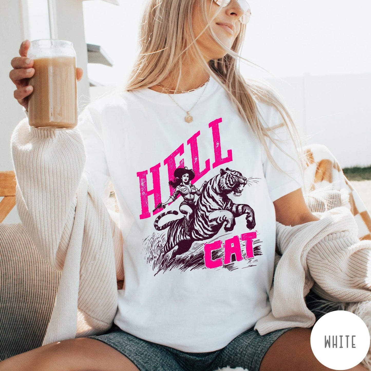 Comfort Colors tee in White featuring retro design of a cowgirl riding a tiger with pink text